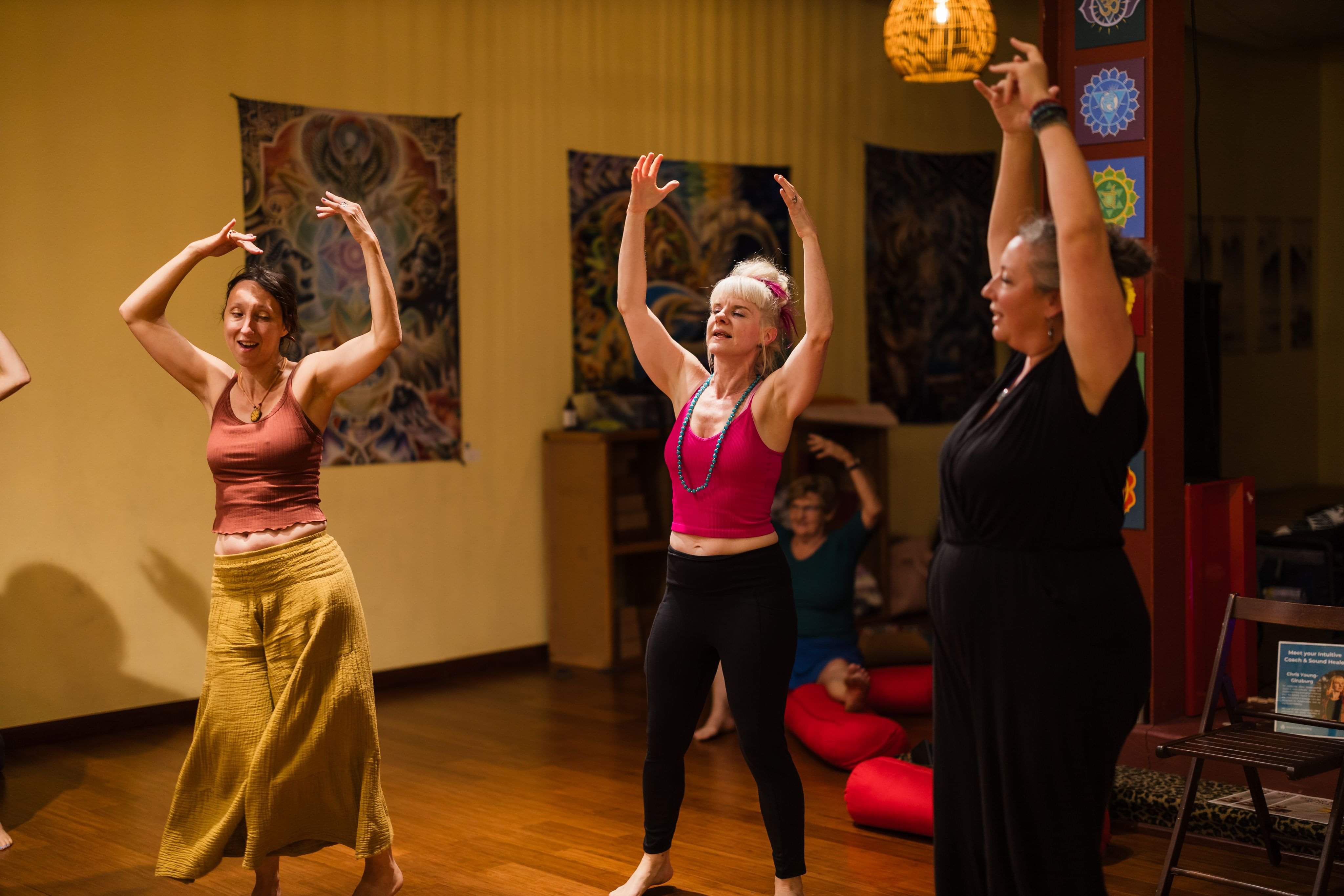 Participants in a relaxed sound healing session